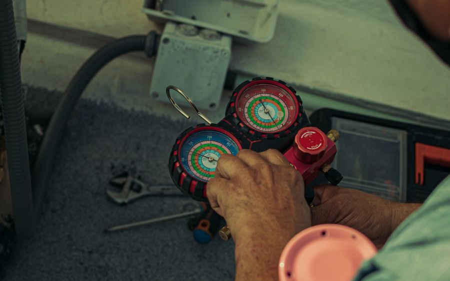 Refrigerant gauges on a system during a tune-up